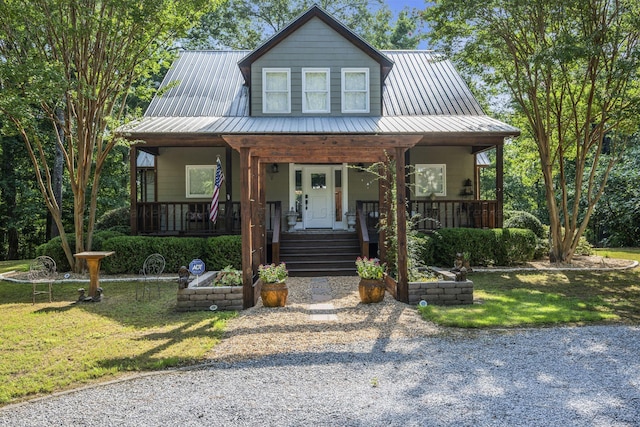 view of front of home featuring a front lawn and a porch