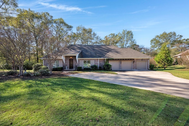 single story home featuring a front lawn and a garage