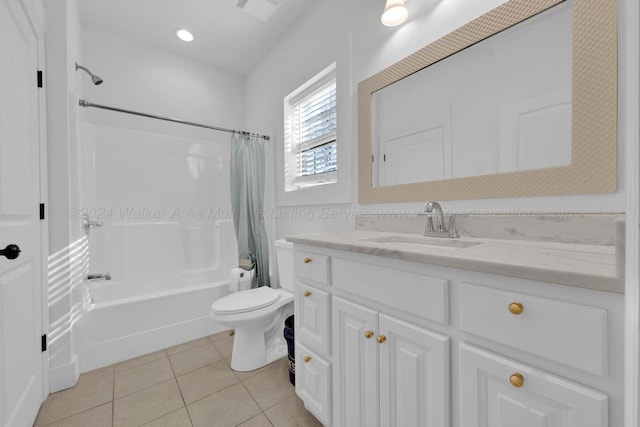 full bathroom featuring shower / bath combo with shower curtain, tile patterned flooring, vanity, and toilet