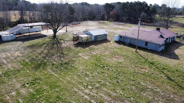 aerial view featuring a view of trees