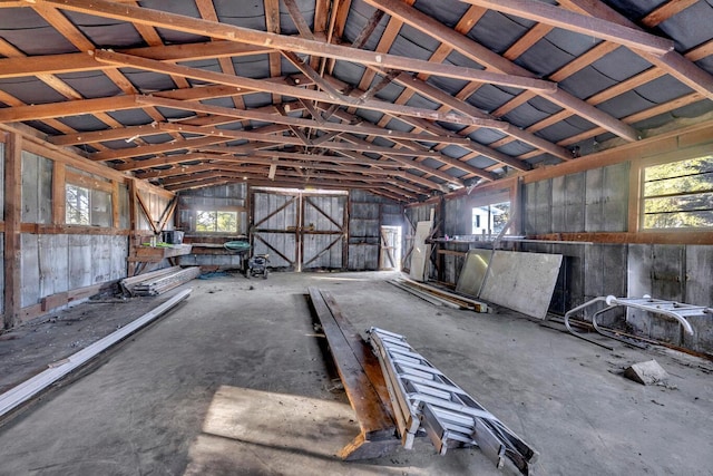 misc room featuring vaulted ceiling and plenty of natural light