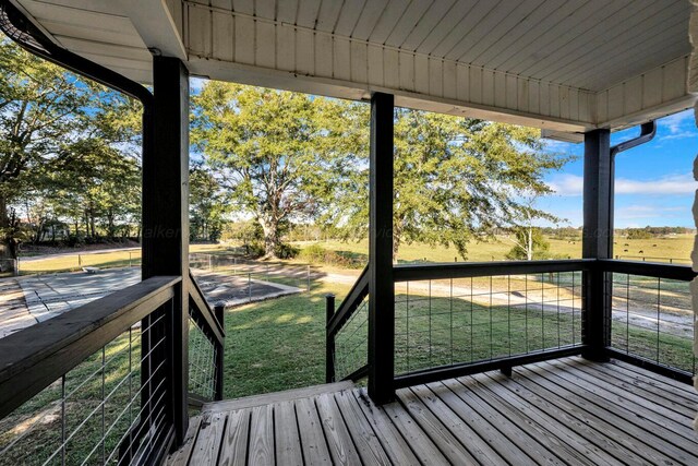 unfurnished sunroom featuring wooden ceiling