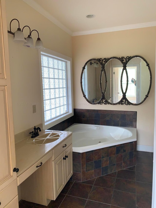 bathroom featuring tile patterned flooring, vanity, ornamental molding, and tiled tub