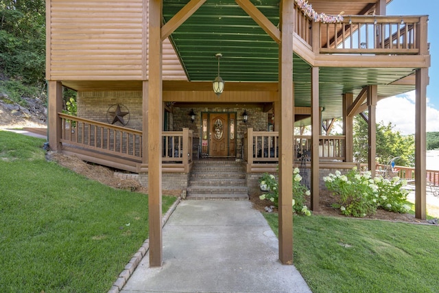 view of patio featuring a porch and a balcony