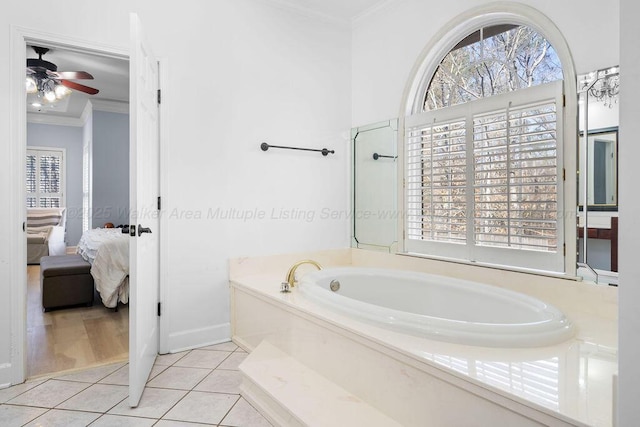 full bathroom with ceiling fan, a garden tub, ornamental molding, tile patterned floors, and ensuite bath