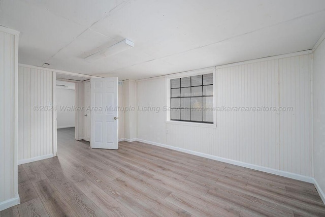 empty room with light wood-type flooring