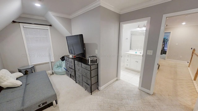 bedroom with light carpet, baseboards, and crown molding