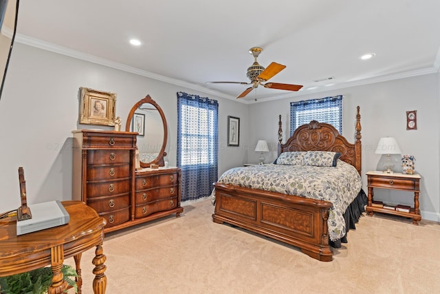 bedroom with light colored carpet, multiple windows, crown molding, and ceiling fan