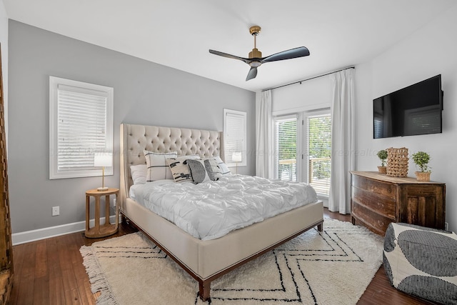 bedroom featuring dark wood-type flooring, access to exterior, and ceiling fan