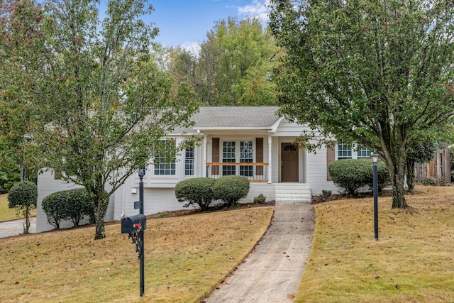 view of front of house with a front lawn