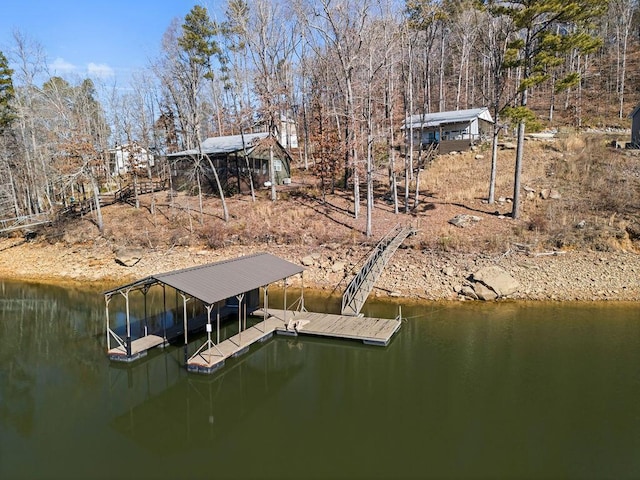 dock area featuring a water view