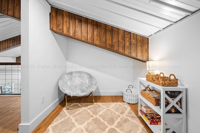 sitting room with hardwood / wood-style floors