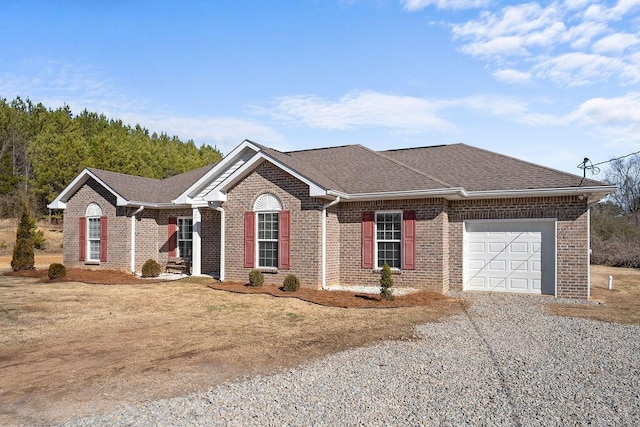 ranch-style home featuring a garage