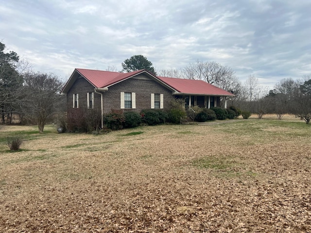 view of property exterior featuring a yard