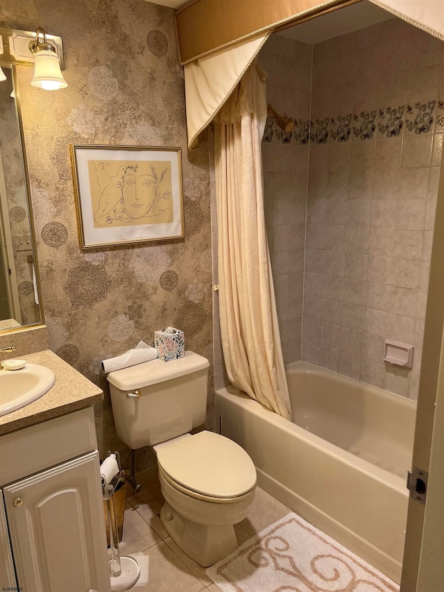 full bathroom featuring tile patterned flooring, vanity, toilet, and shower / bathtub combination with curtain