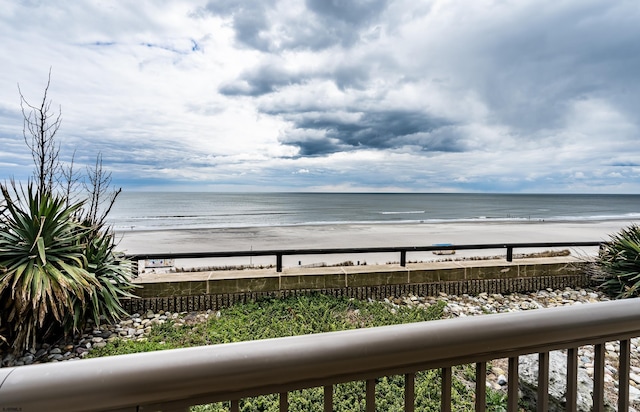 property view of water with a beach view