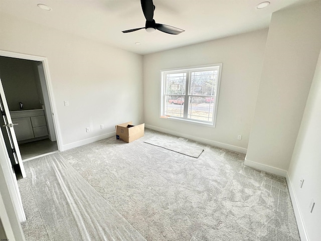 unfurnished bedroom with a ceiling fan, baseboards, carpet flooring, and recessed lighting