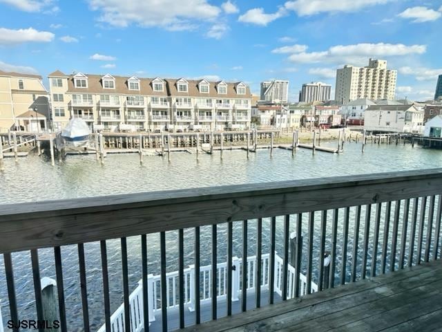 dock area with a water view