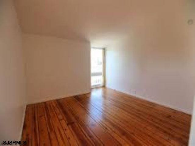 bonus room featuring wood-type flooring