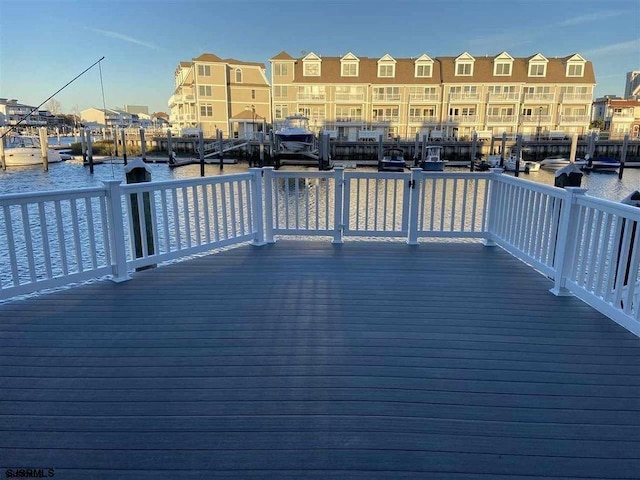 deck featuring a water view