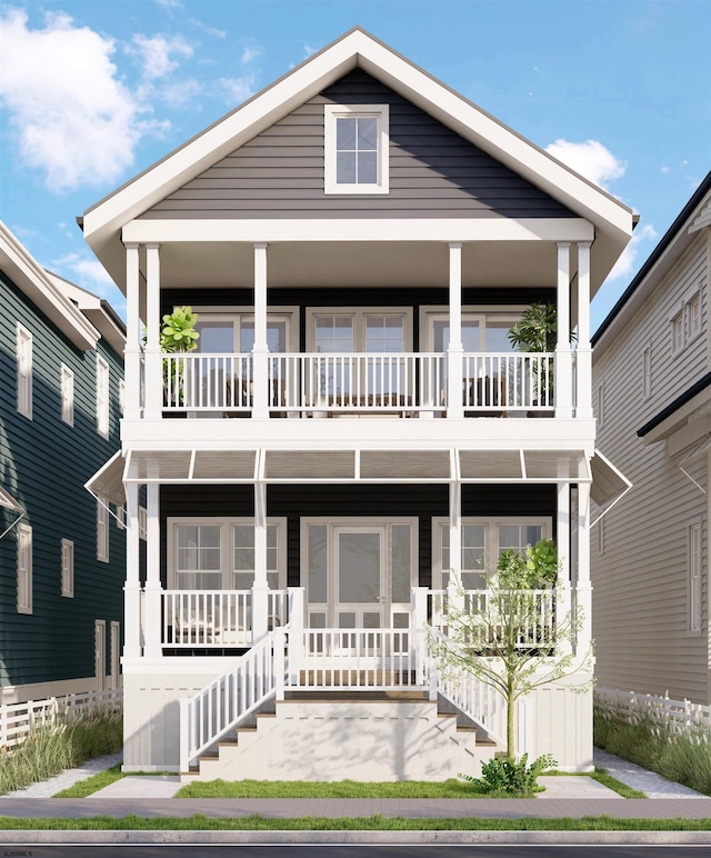 view of front of house with a balcony and covered porch