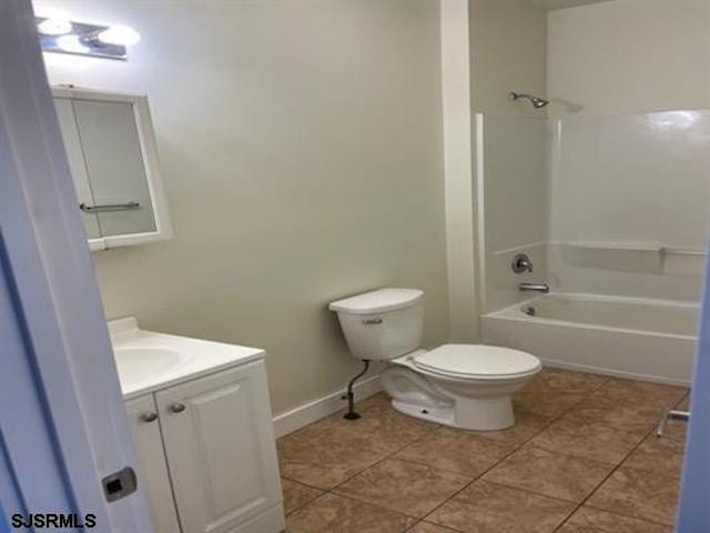 full bathroom with vanity, toilet, shower / washtub combination, and tile patterned floors