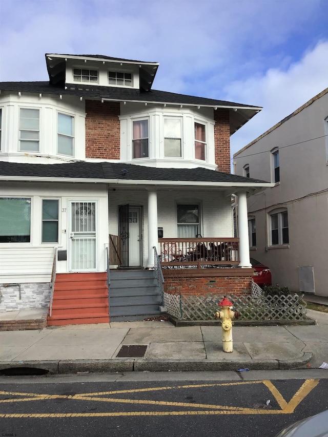 view of front of house with covered porch