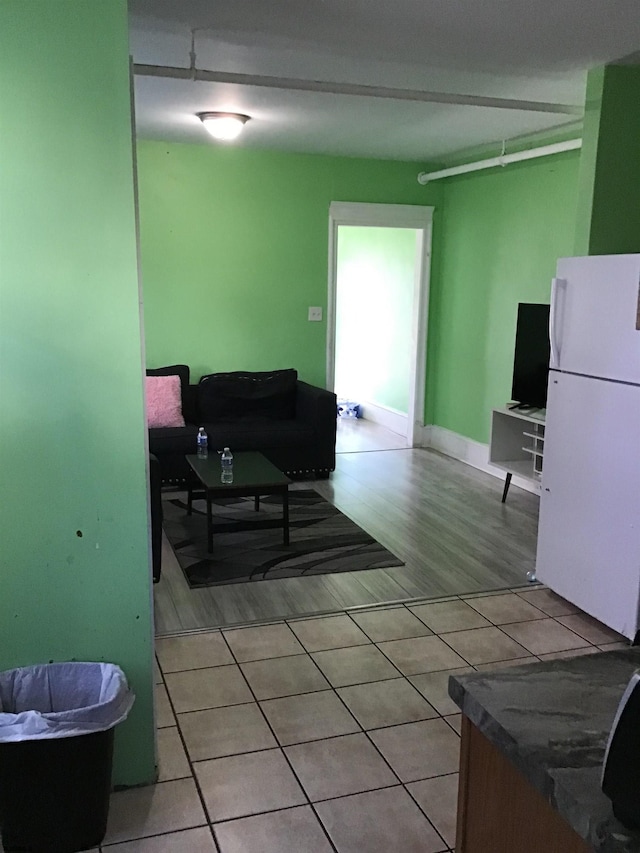 living room featuring light tile flooring