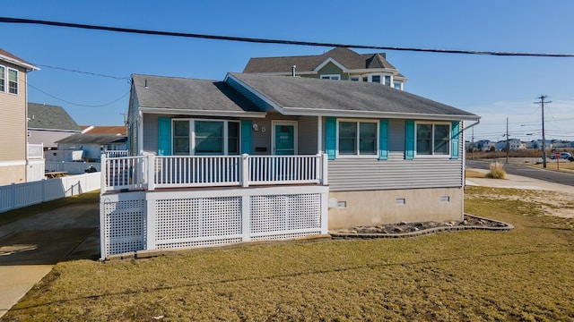 view of front of home with a front yard