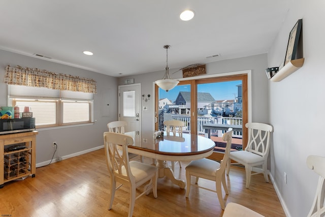 dining area featuring light hardwood / wood-style flooring