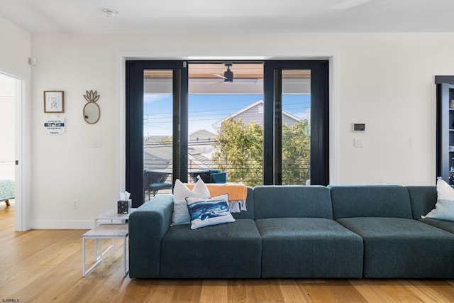 living room with light hardwood / wood-style flooring