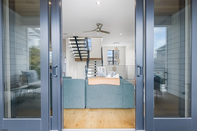 interior space featuring ceiling fan and a balcony