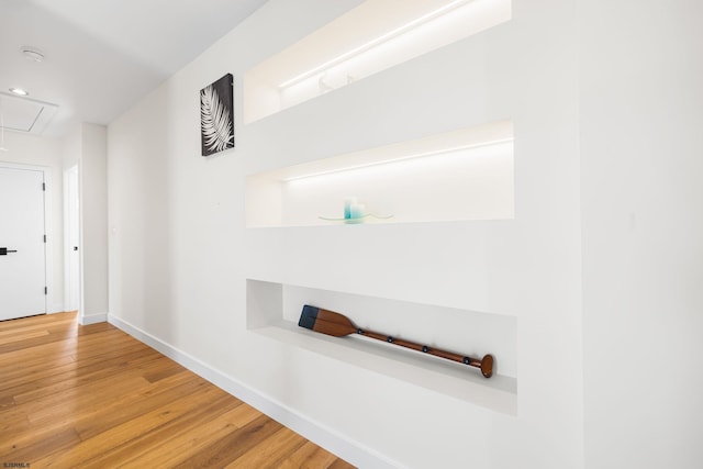 hallway featuring wood-type flooring