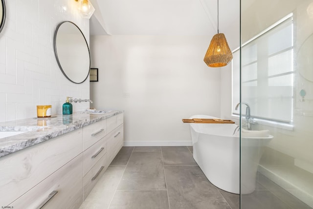 bathroom featuring a shower with shower door, tile floors, and dual bowl vanity