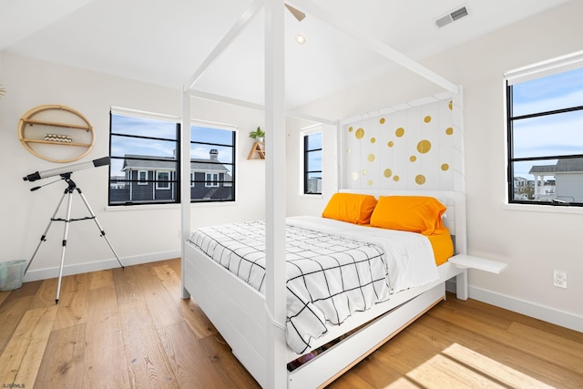 bedroom featuring wood-type flooring