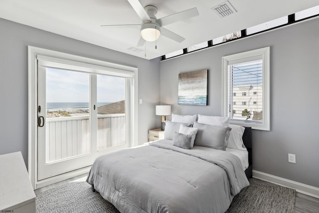 bedroom featuring ceiling fan and dark hardwood / wood-style flooring