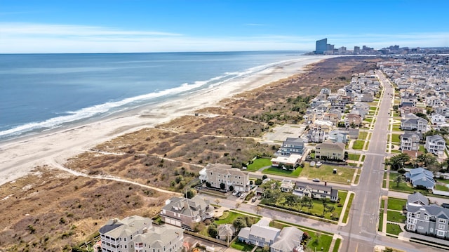 aerial view featuring a beach view and a water view