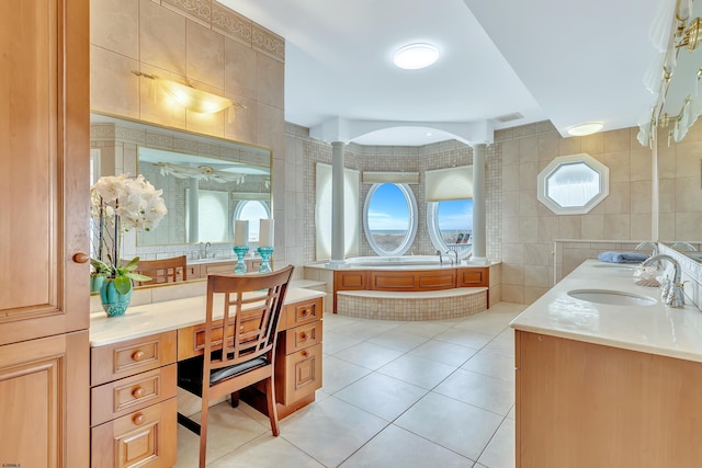 bathroom featuring vanity, tile floors, and tile walls