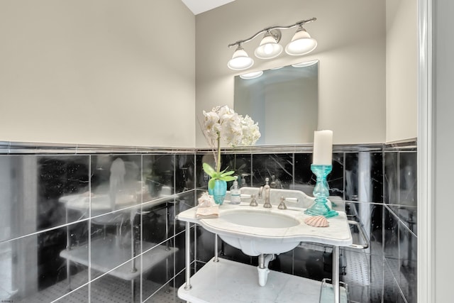 bathroom with tile walls, tasteful backsplash, and tile flooring