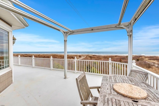 view of terrace featuring a water view