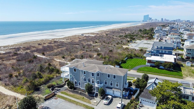 aerial view featuring a beach view and a water view