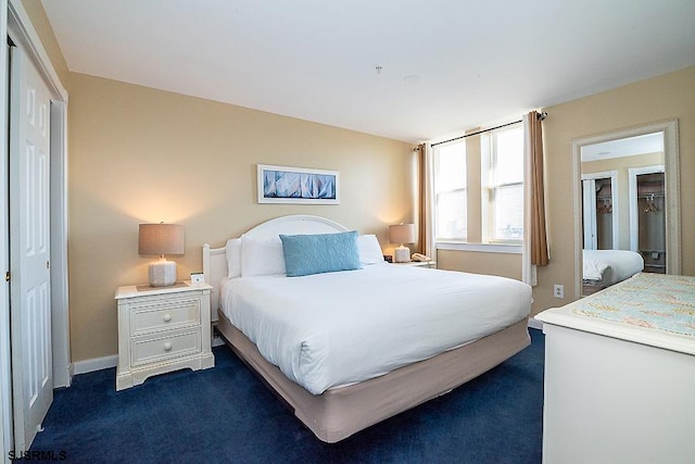 carpeted bedroom featuring a closet