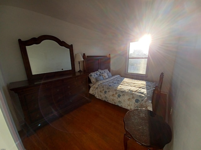 bedroom with wood-type flooring