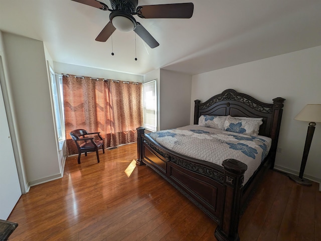 bedroom featuring dark hardwood / wood-style floors and ceiling fan