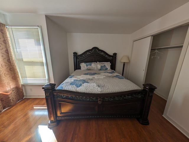 bedroom featuring a closet and hardwood / wood-style flooring