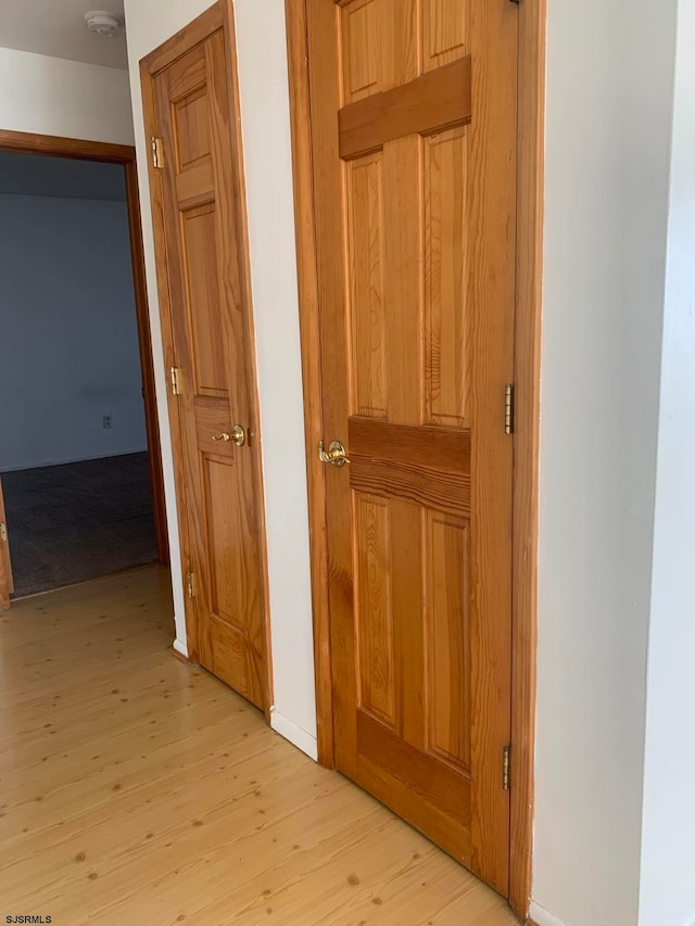 hall featuring light hardwood / wood-style flooring