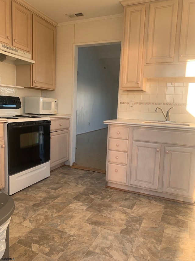 kitchen with backsplash, sink, white appliances, and light tile flooring