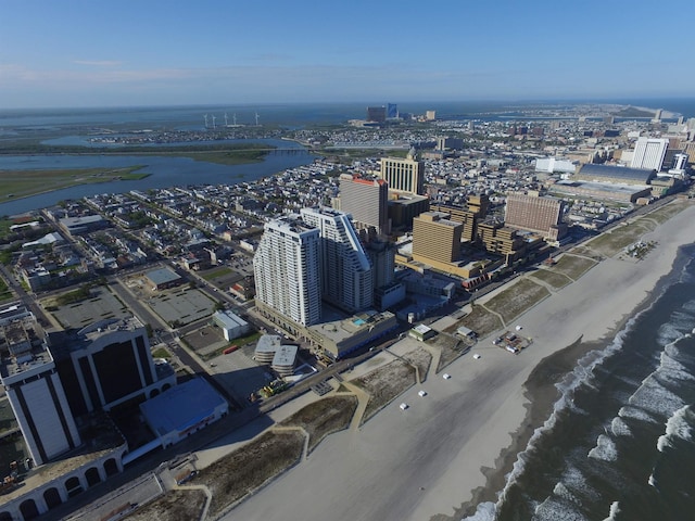 drone / aerial view with a water view and a city view