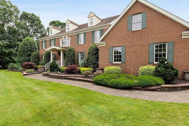 view of front of house with a front yard