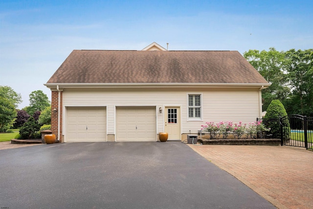 exterior space featuring a garage